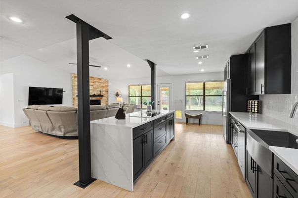 Fireplace, Interior, Kitchen, Living room, Recessed Lighting, Stone Walls, Wood Texture Flooring