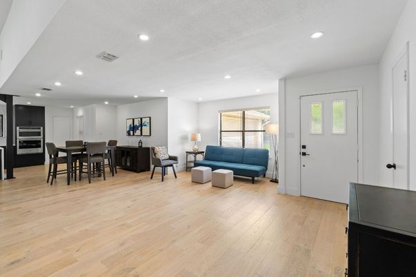 Dining room, Interior, Kitchen, Living room, Recessed Lighting, Stainless Steel Appliances, Wood Texture Flooring
