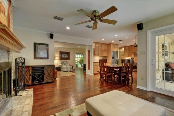 Dining room, Fireplace, Interior, Kitchen, Living room, Recessed Lighting, Stainless Steel Appliances, Wood Texture Flooring