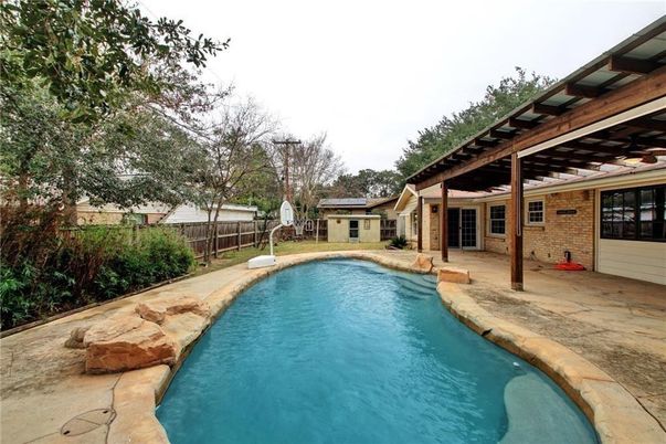 Exterior, Pool, Solar Panels