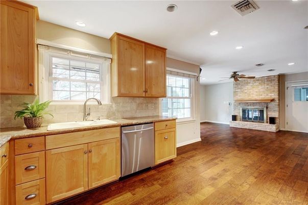 Fireplace, Interior, Kitchen, Recessed Lighting, Stone Walls, Wood Texture Flooring