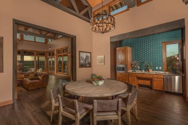 Chandelier, Dining room, Interior, Kitchen, Pendant Lights, Stainless Steel Appliances, Wood Texture Flooring