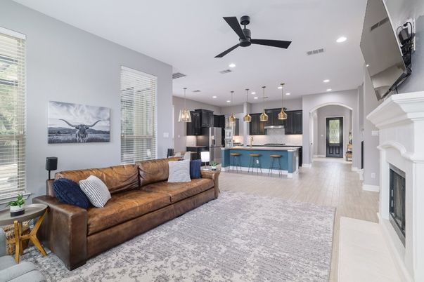 Fireplace, Interior, Kitchen, Living room, Pendant Lights, Recessed Lighting, Stainless Steel Appliances, Wood Texture Flooring