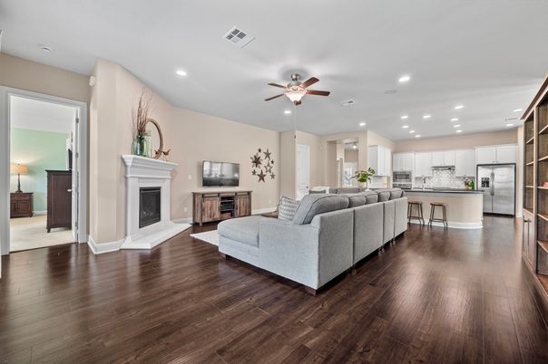 Fireplace, Interior, Kitchen, Living room, Recessed Lighting, Stainless Steel Appliances, Wood Texture Flooring