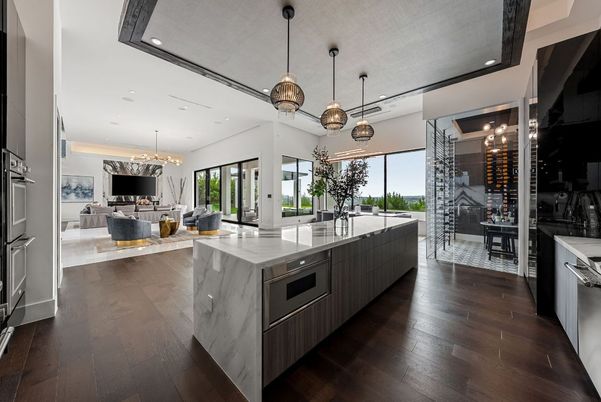 Dining room, Fireplace, Interior, Kitchen, Living room, Pendant Lights, Recessed Lighting, Stainless Steel Appliances, Wine Storage, Wood Texture Flooring