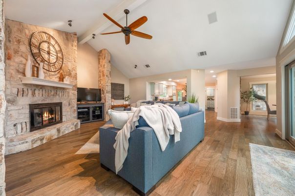 Fireplace, Interior, Living room, Recessed Lighting, Stone Walls, Wood Texture Flooring