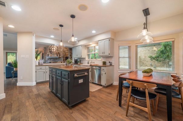 Dining room, Interior, Kitchen, Pendant Lights, Recessed Lighting, Stainless Steel Appliances, Wood Texture Flooring