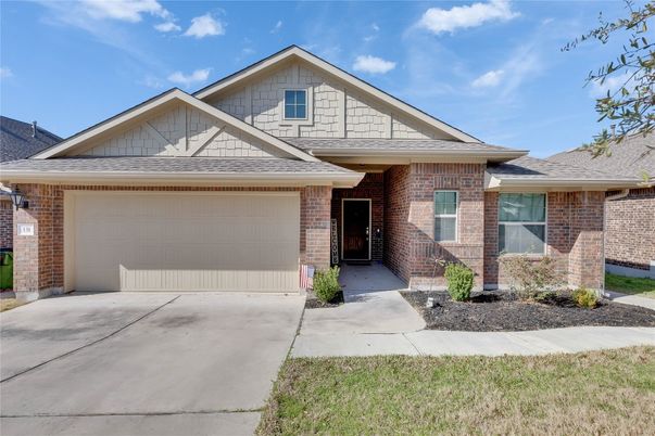 Attached, Exterior, Facade, Brick Facade, American Craftsman