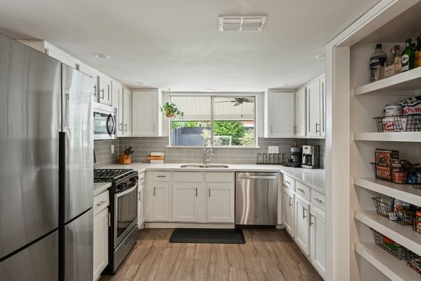 Interior, Kitchen, Recessed Lighting, Stainless Steel Appliances, Wood Texture Flooring