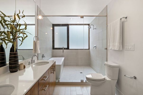 Bathroom, Dual Sink Vanities, Interior, Pendant Lights, Recessed Lighting, Wood Texture Flooring