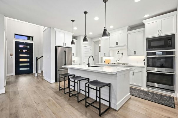 Interior, Kitchen, Pendant Lights, Recessed Lighting, Stainless Steel Appliances, Wood Texture Flooring