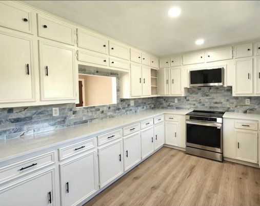 Interior, Kitchen, Recessed Lighting, Stainless Steel Appliances, Wood Texture Flooring