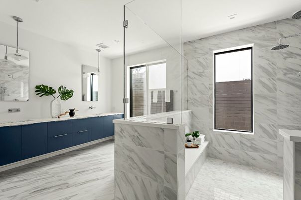 Bathroom, Dual Sink Vanities, Glass Shower, Interior, Marble, Marble Walls, Pendant Lights