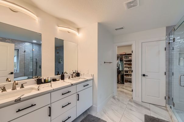 Bathroom, Dual Sink Vanities, Glass Shower, Interior, Marble, Walk-in Closets