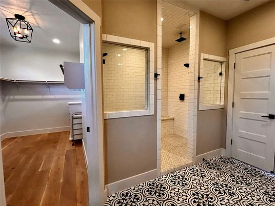 Bathroom, Glass Shower, Interior, Recessed Lighting, Walk-in Closets, Wood Texture Flooring