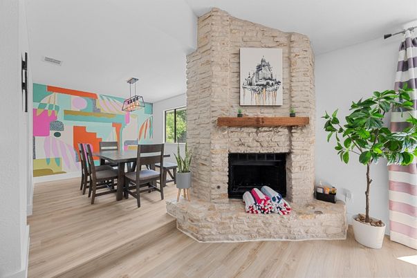 Dining room, Fireplace, Interior, Pendant Lights, Stone Walls, Wood Texture Flooring