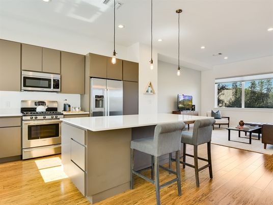 Interior, Kitchen, Pendant Lights, Recessed Lighting, Stainless Steel Appliances, Wood Texture Flooring