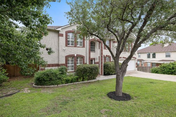 Attached, Backyard, Exterior, Facade, Brick Facade, Mediterranean