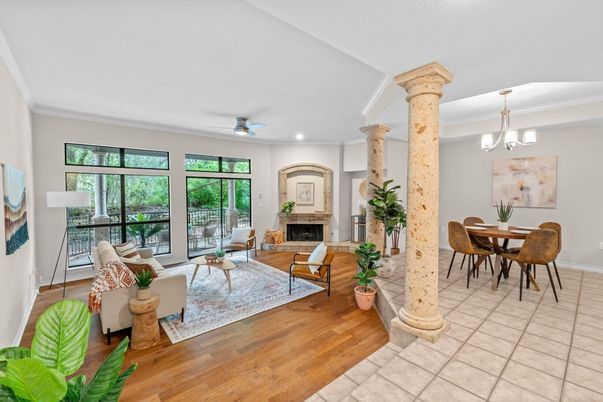 Chandelier, Dining room, Fireplace, Interior, Living room, Recessed Lighting, Wood Texture Flooring