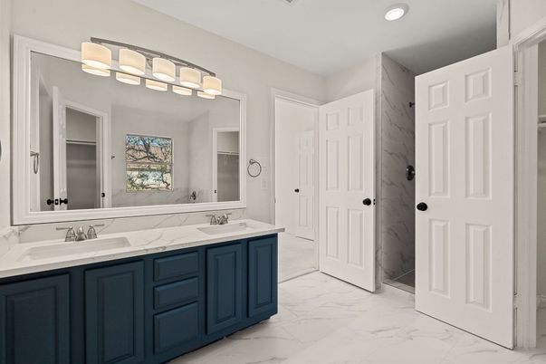 Bathroom, Dual Sink Vanities, Interior, Marble, Marble Walls, Recessed Lighting