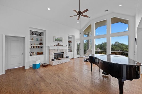 Fireplace, Interior, Piano, Recessed Lighting, Wood Texture Flooring