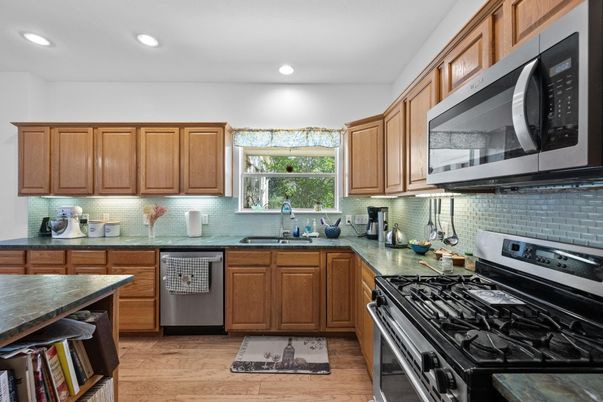 Interior, Kitchen, Recessed Lighting, Stainless Steel Appliances, Wood Texture Flooring
