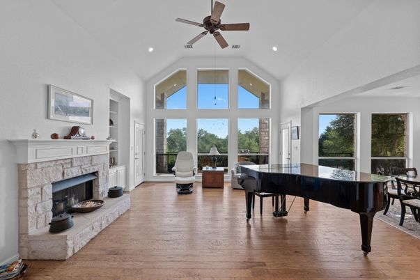 Fireplace, Interior, Piano, Recessed Lighting, Wood Texture Flooring