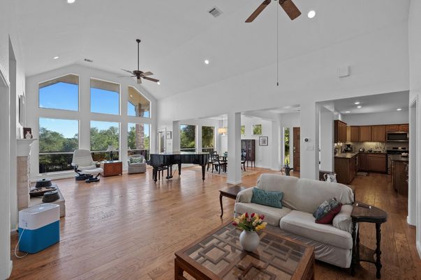 Fireplace, Interior, Kitchen, Living room, Pendant Lights, Piano, Recessed Lighting, Stainless Steel Appliances, Wood Texture Flooring