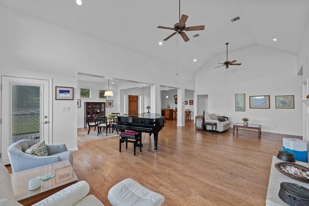 Dining room, Interior, Living room, Pendant Lights, Piano, Recessed Lighting, Wood Texture Flooring