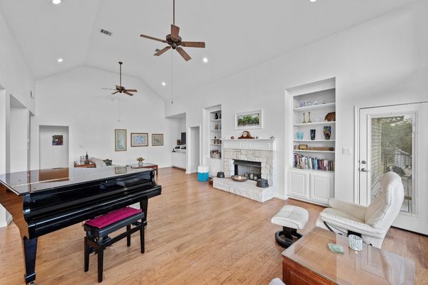Fireplace, Interior, Piano, Recessed Lighting, Wood Texture Flooring