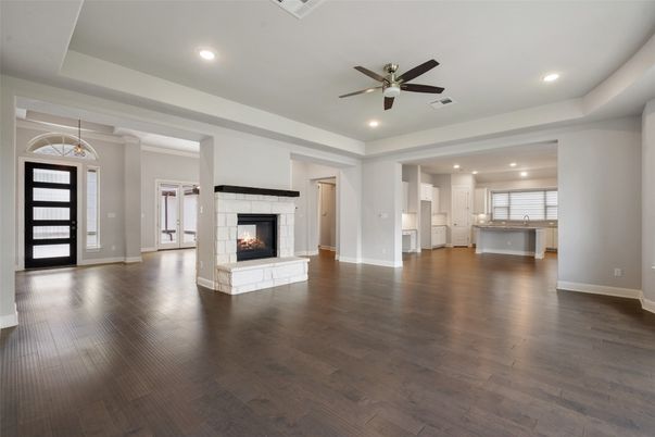 Empty room, Fireplace, Interior, Pendant Lights, Recessed Lighting, Wood Texture Flooring