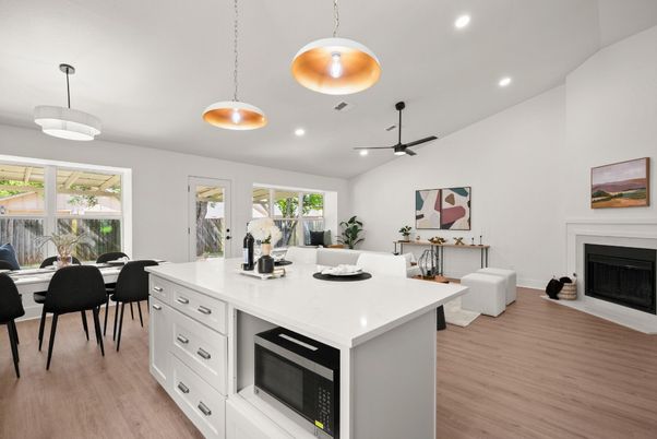 Dining room, Fireplace, Interior, Kitchen, Pendant Lights, Recessed Lighting, Wood Texture Flooring