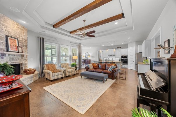 Fireplace, Interior, Kitchen, Living room, Pendant Lights, Piano, Recessed Lighting, Stainless Steel Appliances, Stone Walls, Wooden Beams