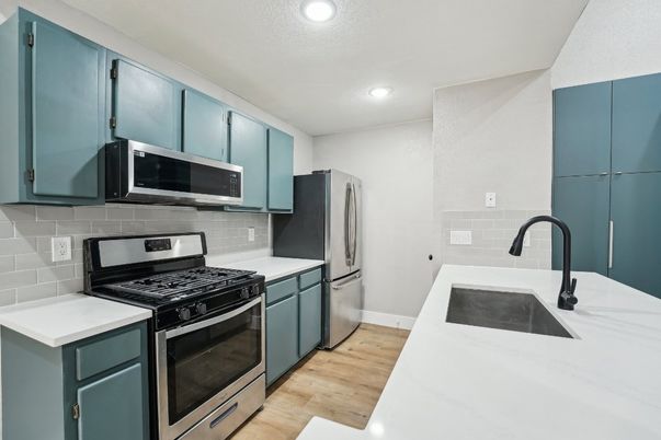 Interior, Kitchen, Recessed Lighting, Stainless Steel Appliances, Wood Texture Flooring