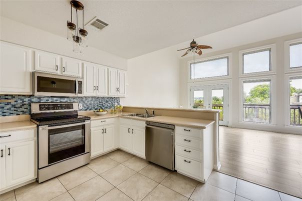 Interior, Kitchen, Pendant Lights, Stainless Steel Appliances, Wood Texture Flooring