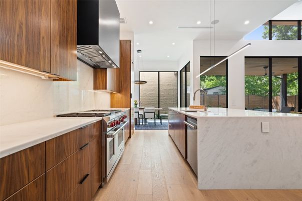 Dining room, Interior, Kitchen, Pendant Lights, Recessed Lighting, Stainless Steel Appliances, Wood Texture Flooring