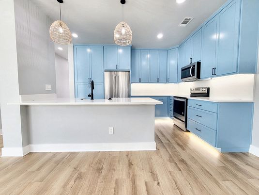 Interior, Kitchen, Pendant Lights, Recessed Lighting, Stainless Steel Appliances, Wood Texture Flooring