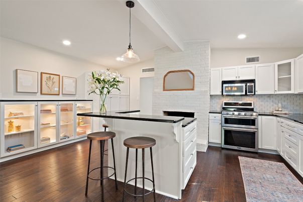 Interior, Kitchen, Pendant Lights, Recessed Lighting, Stainless Steel Appliances, Stone Walls, Wood Texture Flooring