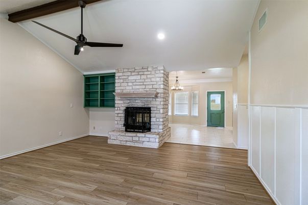 Empty room, Fireplace, Interior, Pendant Lights, Recessed Lighting, Wooden Beams, Wood Texture Flooring