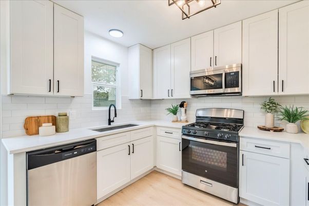 Interior, Kitchen, Recessed Lighting, Stainless Steel Appliances, Wood Texture Flooring