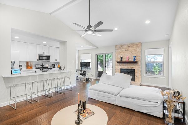 Fireplace, Interior, Kitchen, Living room, Recessed Lighting, Stone Walls, Wood Texture Flooring