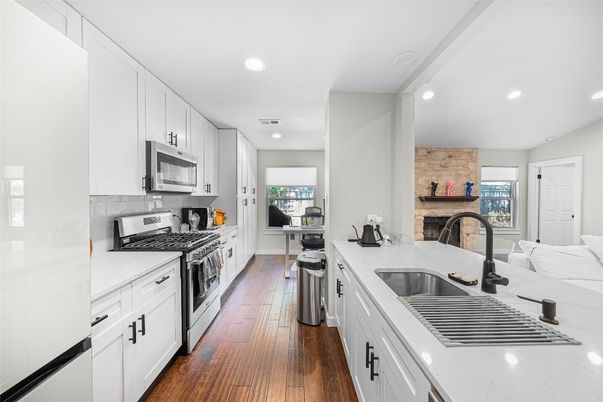 Interior, Kitchen, Recessed Lighting, Stainless Steel Appliances, Wood Texture Flooring