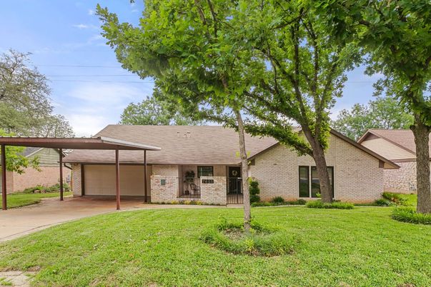 Attached, Backyard, Exterior, Facade, Brick Facade, Ranch