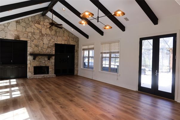 Empty room, Fireplace, Interior, Stone Walls, Wooden Beams, Wood Texture Flooring
