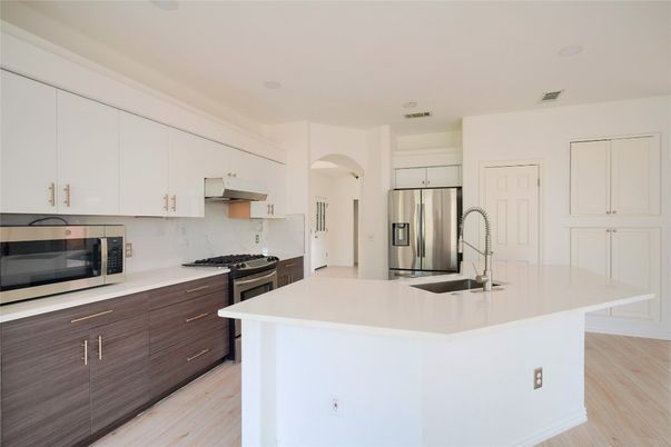 Interior, Kitchen, Recessed Lighting, Stainless Steel Appliances, Wood Texture Flooring