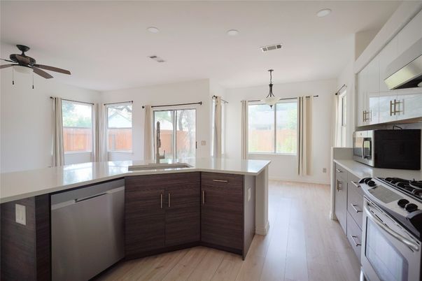Interior, Kitchen, Pendant Lights, Stainless Steel Appliances, Wood Texture Flooring