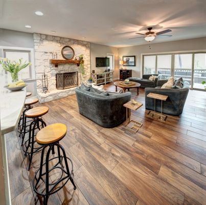 Fireplace, Interior, Living room, Recessed Lighting, Stone Walls, Wood Texture Flooring