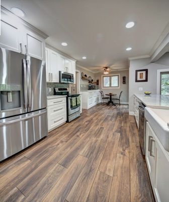 Dining room, Interior, Kitchen, Recessed Lighting, Stainless Steel Appliances, Wood Texture Flooring