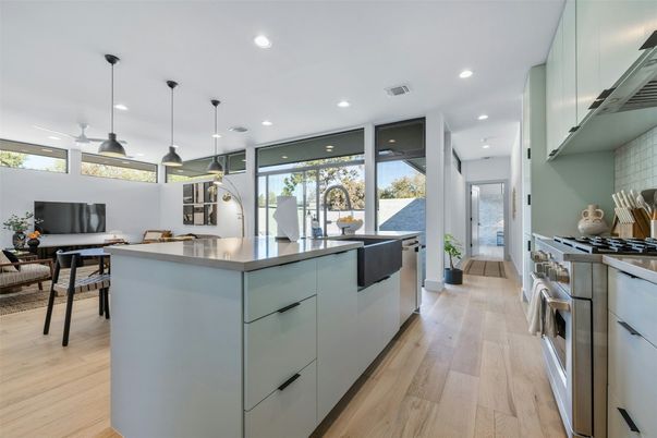 Dining room, Interior, Kitchen, Pendant Lights, Recessed Lighting, Stainless Steel Appliances, Wood Texture Flooring