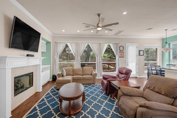 Dining room, Fireplace, Interior, Living room, Pendant Lights, Recessed Lighting, Wood Texture Flooring